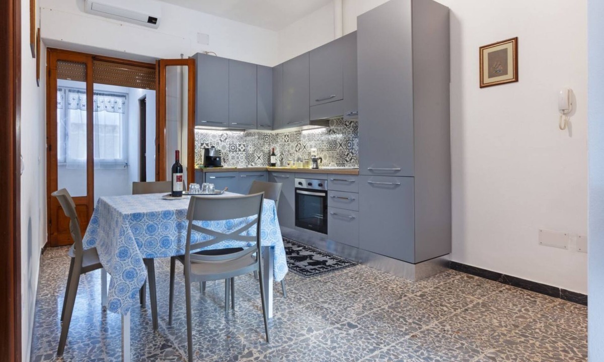 Sant'Antioco Apartment | A cozy and spacious 80 square meters apartment, perfect for four people, located on the first floor of a typical Sant'Antioco building (NO elevator).The property is located a short distance from the town center and offers quick access to the seafront. It