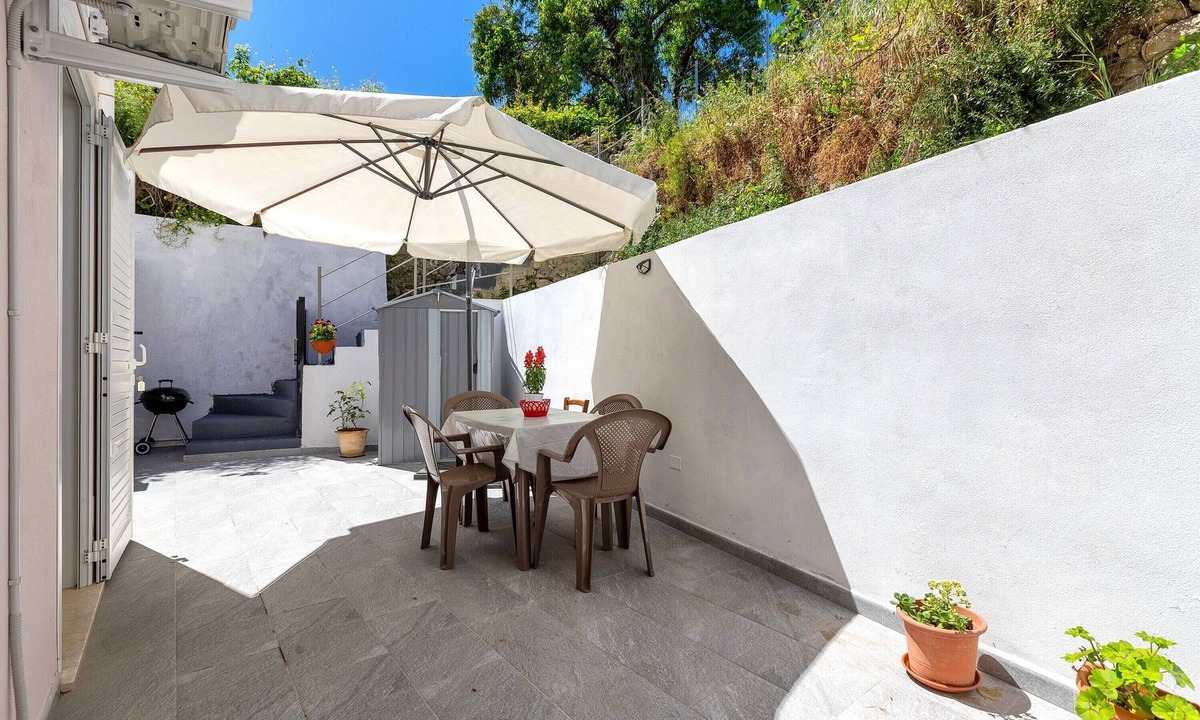 Nulvi Apartment | Apartment 'Casa Angela' with Private Garden, Balcony and Air Conditioning