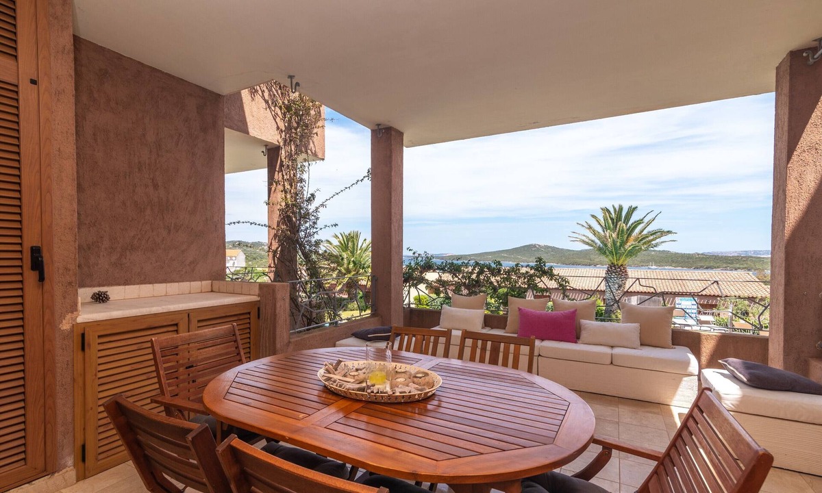 Porto Pozzo Apartment | Apartment 'Il Fiordo 17' with Sea View, Shared Pool and Air Conditioning