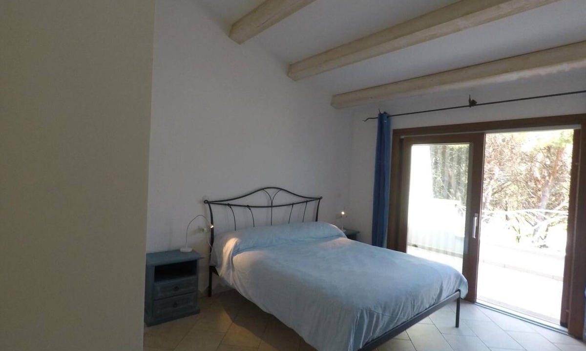Cala Liberotto Apartment | Apartment 'La Corte Degli Ulivi C' with Sea View, Wi-Fi and Air Conditioning