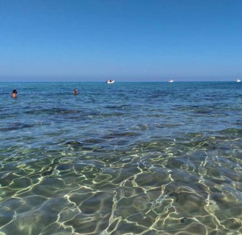 Lu Bagnu Apartment | Attico trilocale vista mare strepitosa, 200 mt dal mare, WiFi Powerful