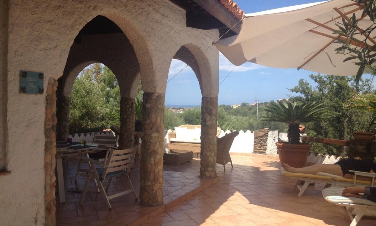 San Teodoro Villa | "Bella Vista" Villa with Ocean View, Garden, and Wi-Fi