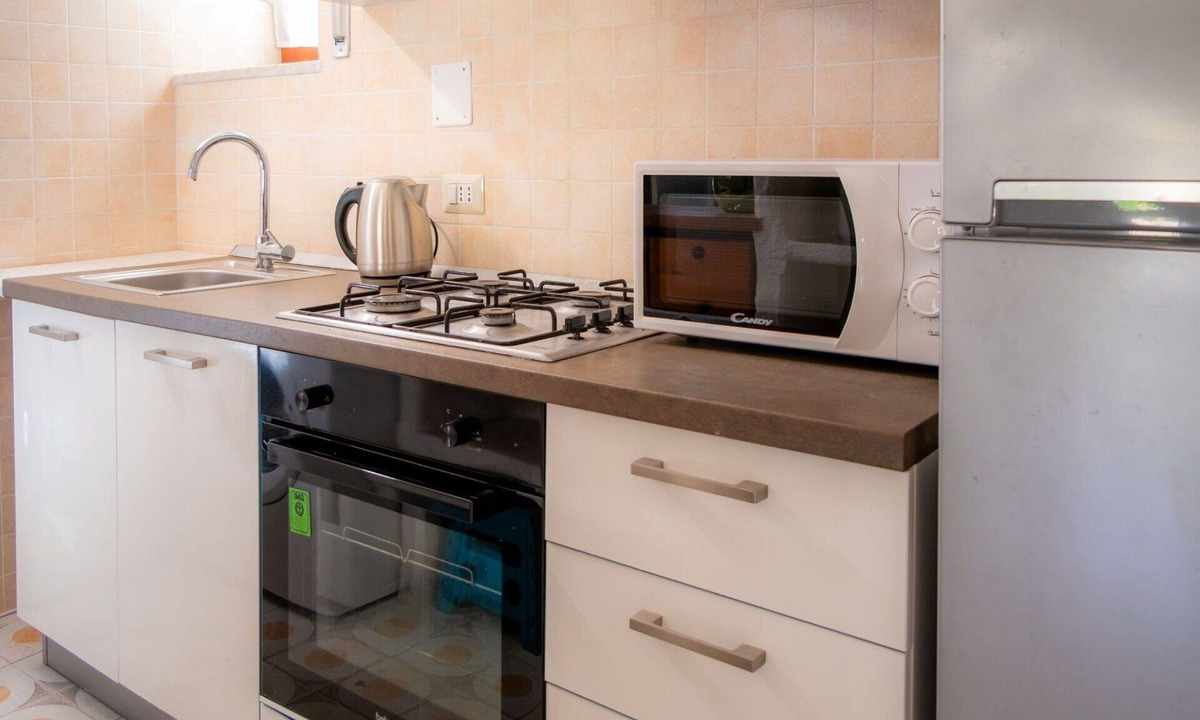Villaggio Piras Apartment | Cosy apartment for 4 guests with A/C, TV, patio and pets allowed