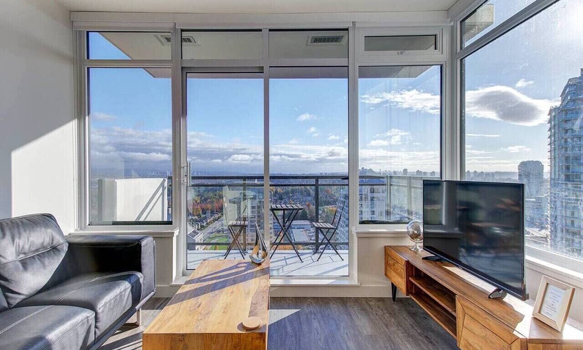 Metrotown Apartment | Executive 1BR + Den with Panoramic Balcony, Pool & Gym in Metrotown