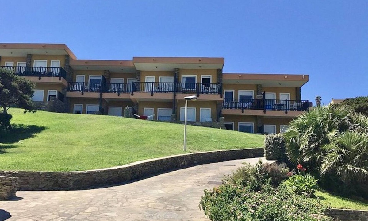 La Pelosa Bed & Breakfast | Functional 28 sq m room.Comprising a double bed, two single beds, and a private bathroom with shower, bidet, and hairdryer. The room also features an outdoor space with a sea view, a patio or terrace, and a table and chairs. Breakfast is included in the