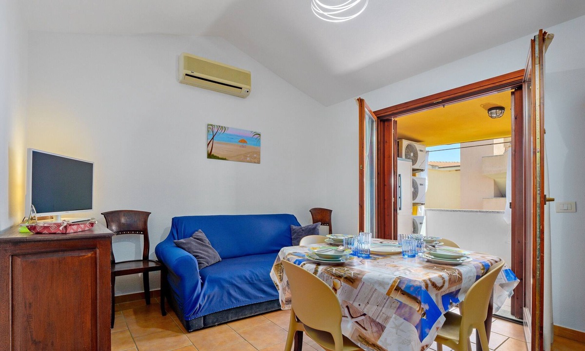 Olbia Apartment | Holiday Home 'Casa Vacanza Olbia Mare' with Sea View, Shared Garden and Air Conditioning
