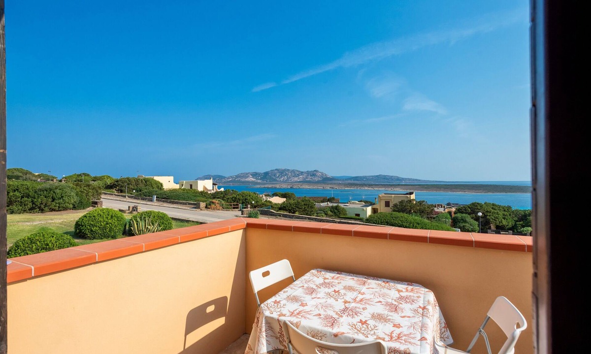 La Pelosa House | Holiday Home "Pergola 714" Steps from the Beach with Sea View and Balcony