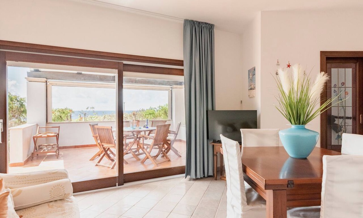 Santa Reparata House | Holiday Home 'Villetta Fronte Mare A S. Reparata' with Sea View, Wi-Fi and Air Conditioning