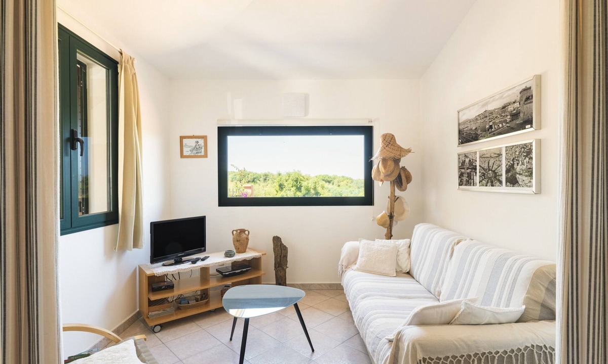 Torre di Bari House | Holiday Home 'Villa De La Torré Di Bari Sardo' with Sea View, Private Terrace and Air Conditioning
