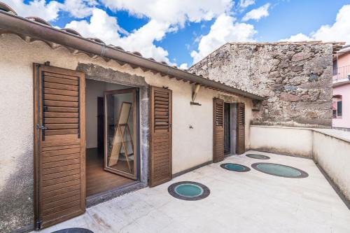 Seneghe Villa | Home Slow between Sea and Olive Trees, Terrace and Tranquility in the Village of Seneghe