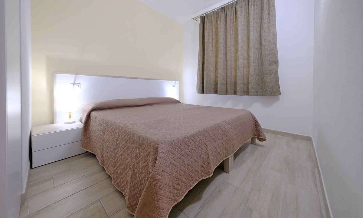 Iglesias Historic Centre Apartment | Iglesias apartments with AC, kitchen, and parking. Great for holidays.