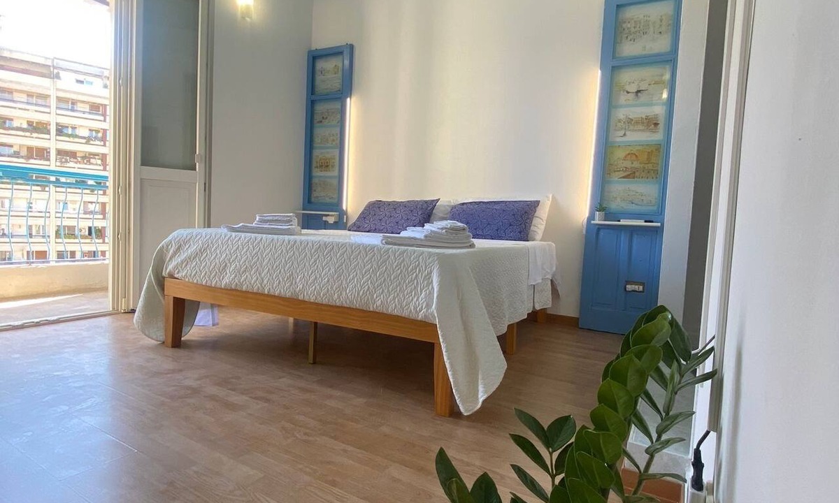 Cagliari Apartment | Maison Bleue terrace overlooking the sea and the old town