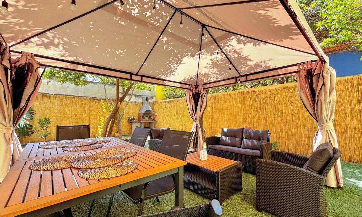 Province of Cagliari Apartment | Modern home with garden & BBQ, between Cagliari city center and the sea