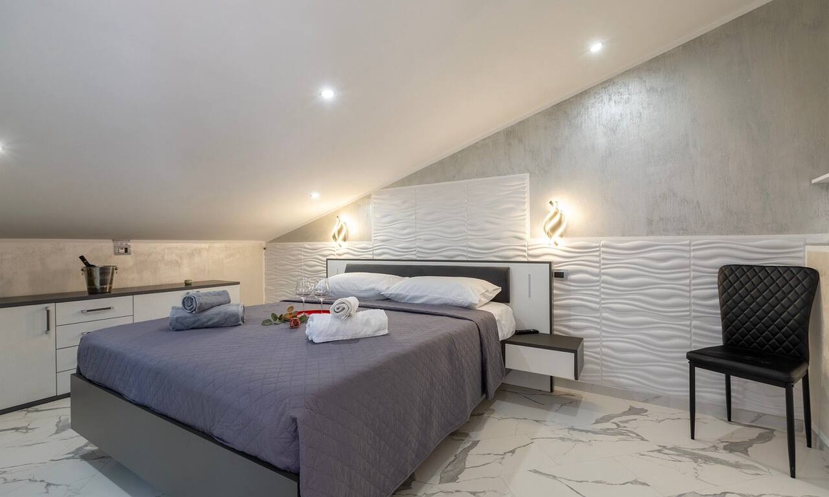 Nulvi Apartment | Room 'Camera Deluxe' with Wi-Fi and Air Conditioning
