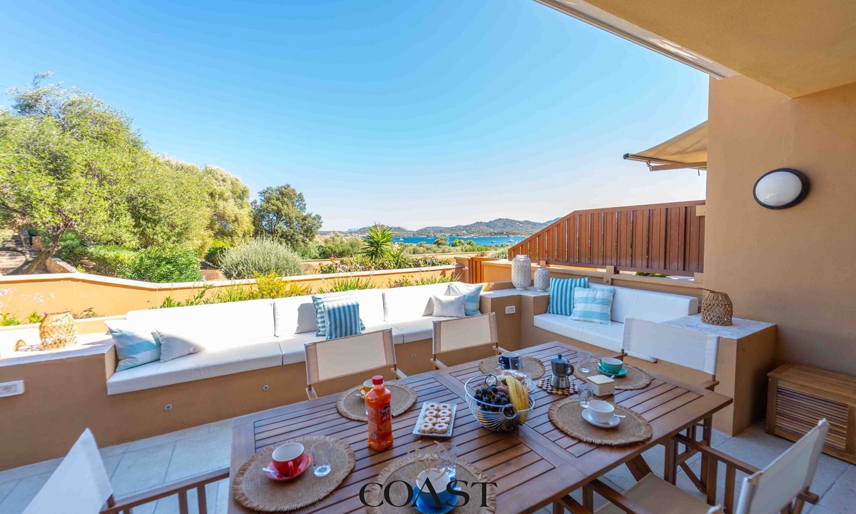 Portisco Apartment | Seaside Garden - With Wi-Fi, A/C and sea view