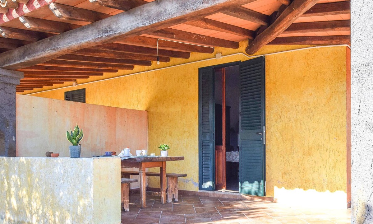 Orosei House | Spend an unforgettable vacation in this inviting cottage with beautiful views of the countryside.