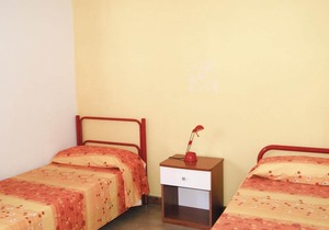 This apartment is located in a residential complex in front of the tourist port of Castelsardo, in S