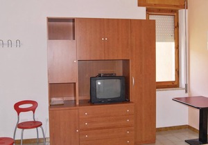 This apartment is located in a residential complex in front of the tourist port of Castelsardo, in S