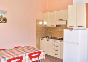 This apartment is located in a residential complex in front of the tourist port of Castelsardo, in S