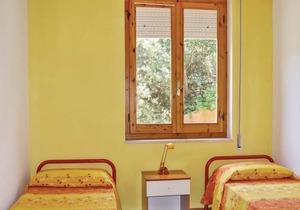 This apartment is located in a residential complex in front of the tourist port of Castelsardo, in S