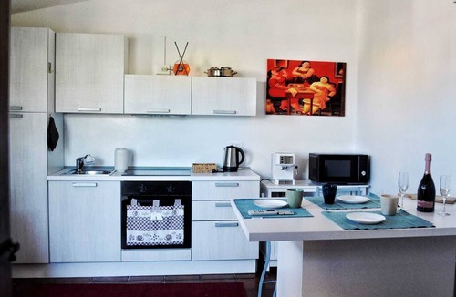 S'oru e Mari Apartment | A delightful section of a villa surrounded by greenery and just a stone's throw from the sea