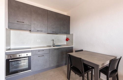 Castelsardo Apartment | Air-conditioned, in residence, with pool and patio