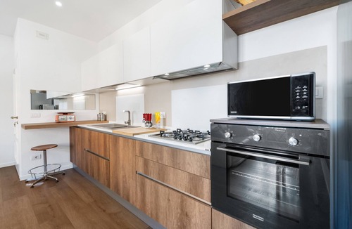 Guspini Apartment | Apartment '4 Seasons' with Balcony, Wi-Fi and Air Conditioning