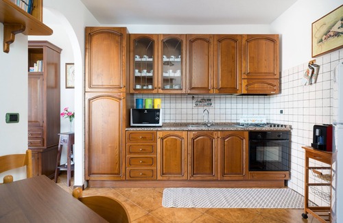 Cala Gonone Apartment | Apartment 'Appartamento Ginepro' with Private Terrace, Wi-Fi and Air Conditioning