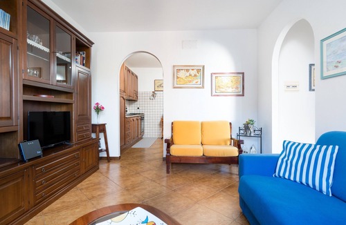 Cala Gonone Apartment | Apartment 'Appartamento Ginepro' with Private Terrace, Wi-Fi and Air Conditioning
