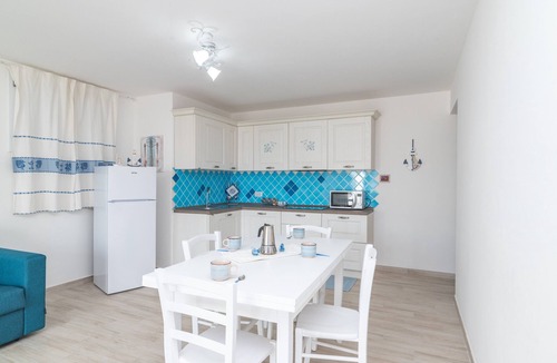 Budoni Apartment | Apartment 'Bilocale Nuovo Budoni Centro' with Private Terrace, Wi-Fi and Air Conditioning
