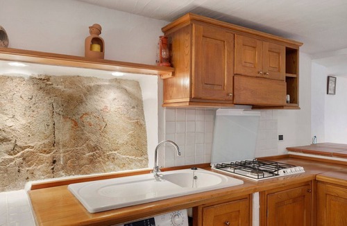 Li Cuncheddi Apartment | Apartment 'Casa Vacanze Eucalipto' with Sea View, Shared Pool and Private Garden