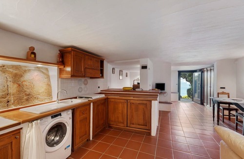 Li Cuncheddi Apartment | Apartment 'Casa Vacanze Eucalipto' with Sea View, Shared Pool and Private Garden