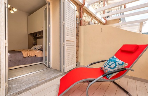 Trinita d'Agultu e Vignola Apartment | Apartment 'Gaaya's' with Private Terrace and Air Conditioning
