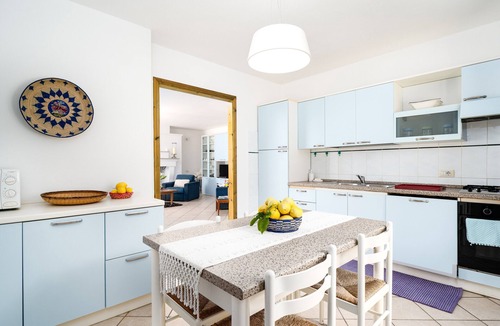 Sas Linnas Siccas Apartment | Apartment 'La Vela Rossa' with Shared Pool, Wi-Fi and Air Conditioning