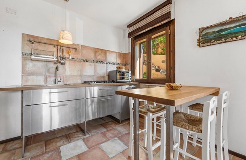 Porto Pino Apartment | Apartment 'La Luna Sulla Duna' with Sea View, Private Terrace and Air Conditioning
