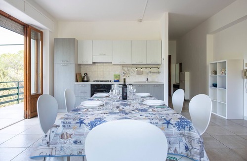 Cala Gonone Apartment | Apartment 'Oriente' with Private Terrace, Wi-Fi and Air Conditioning