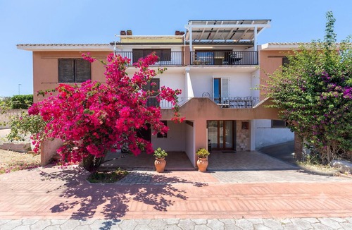 Lu Bagnu Apartment | Apartment 'Penthouse Villa Stefania' with Sea View, Wi-Fi and Air Conditioning