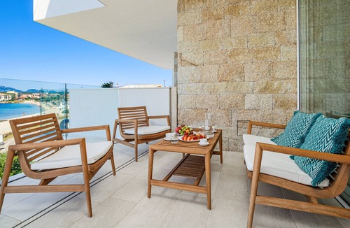 Golfo Aranci Apartment | Apartment 'Sos Arangiu - By and Service' with Sea View, Wi-Fi and Air Conditioning