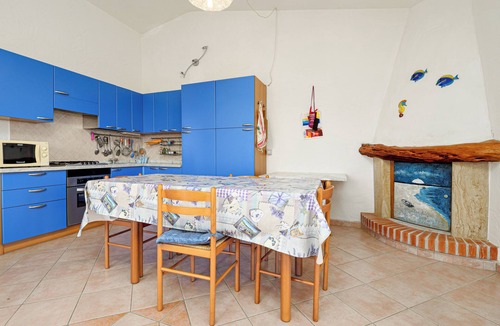 Monte Petrosu Apartment | Apartment 'Tavolara Monte Petrosu' with Mountain View, Private Terrace and Air Conditioning