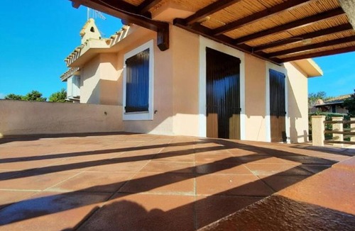 Notteri Apartment | Apartment 'Villa Porto Giunco' with Sea View, Private Terrace and Air Conditioning