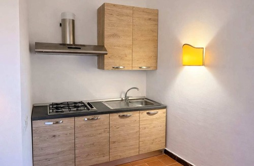 Punta De Su Turrione Apartment | Apartment with veranda near Stintino