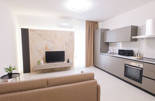 Marcianise Apartment | ARQO Comfort Apartment – One Bedroom with Living Room
