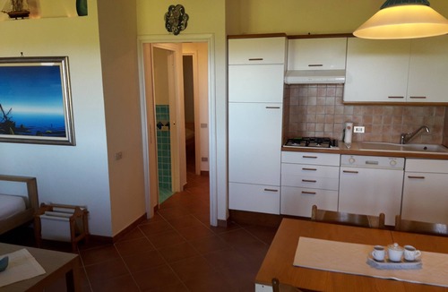 Golfo di Marinella Apartment | BEACH AT 200 METERS AND 50 METERS SWIMMING POOL, AIR CONDITIONING, PARKING PLACE