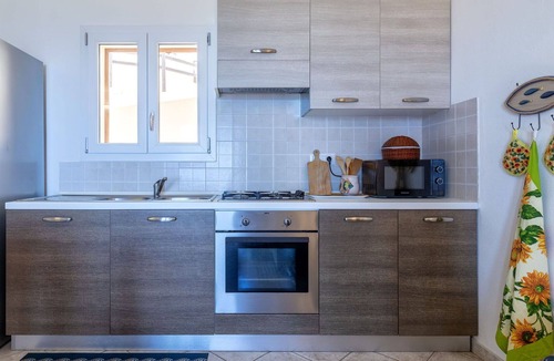 Trinita d'Agultu Apartment | Beautiful apartment for 4 guests with pool, A/C, TV and patio