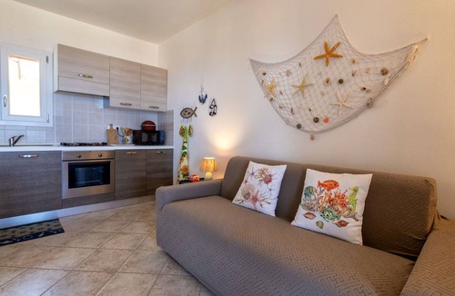 Trinita d'Agultu Apartment | Beautiful apartment for 4 guests with pool, A/C, TV and patio