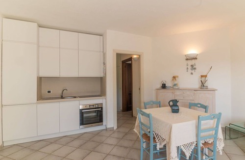 Baia Caddinas Apartment | Beautiful apartment for 4 people with WIFI, pool, A/C, TV, terrace and pets allowed