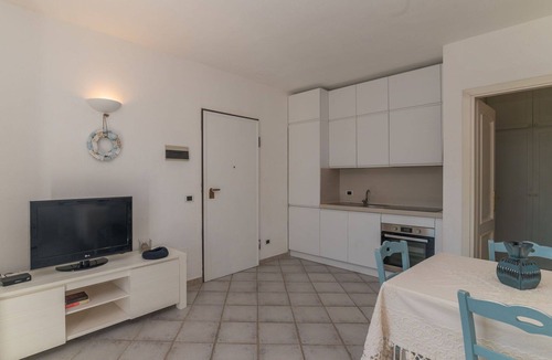 Baia Caddinas Apartment | Beautiful apartment for 4 people with WIFI, pool, A/C, TV, terrace and pets allowed
