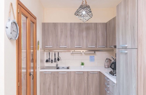 Porto Pozzo Apartment | Beautiful apartment for 4 people with WIFI, A/C, pool, terrace and pets allowed