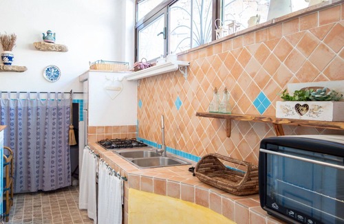Capo d'Orso Apartment | Beautiful apartment for 6 guests with A/C, WIFI, TV and patio