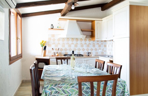 San Teodoro Apartment | Belvedere Apartment with Sea View, Wi-Fi, and Air Conditioning